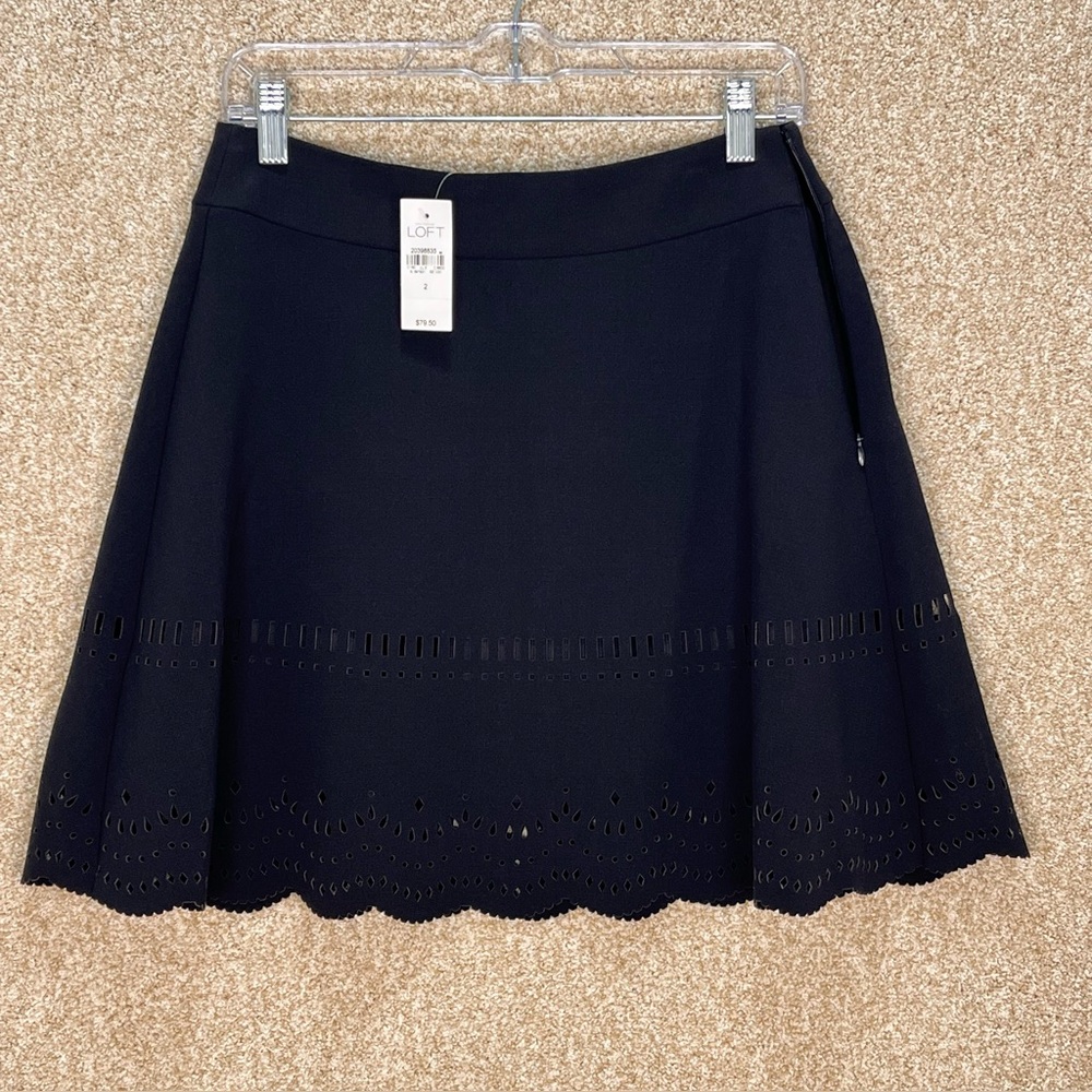 Imperfect NWT black skirt unique‎ hemline fun pattern classic black skirt size 2